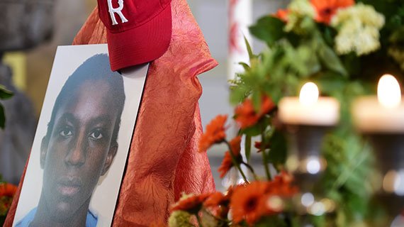 A portrait of 17-year-old Islamic State (IS) fighter Florent Prince N. at his memorial service in May 2016, at St. Pauli Church in Hamburg, Germany. The Cameroon native grew up as a Christian and died with IS in Syria. ips_atran_570px.jpg