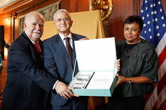 Carnegie Corporation president Vartan Gregorian, Afghan Minister of Information and Culture Abdul Bari Jahani, and Librarian of Congress Carla Hayden display a box of hard drives that contain the documents digitized through the Afghanistan Project. GregorianJahaniHayden570px.jpg
