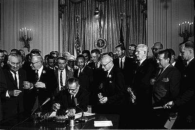 President Lyndon Johnson and officials President Lyndon Johnson and officials