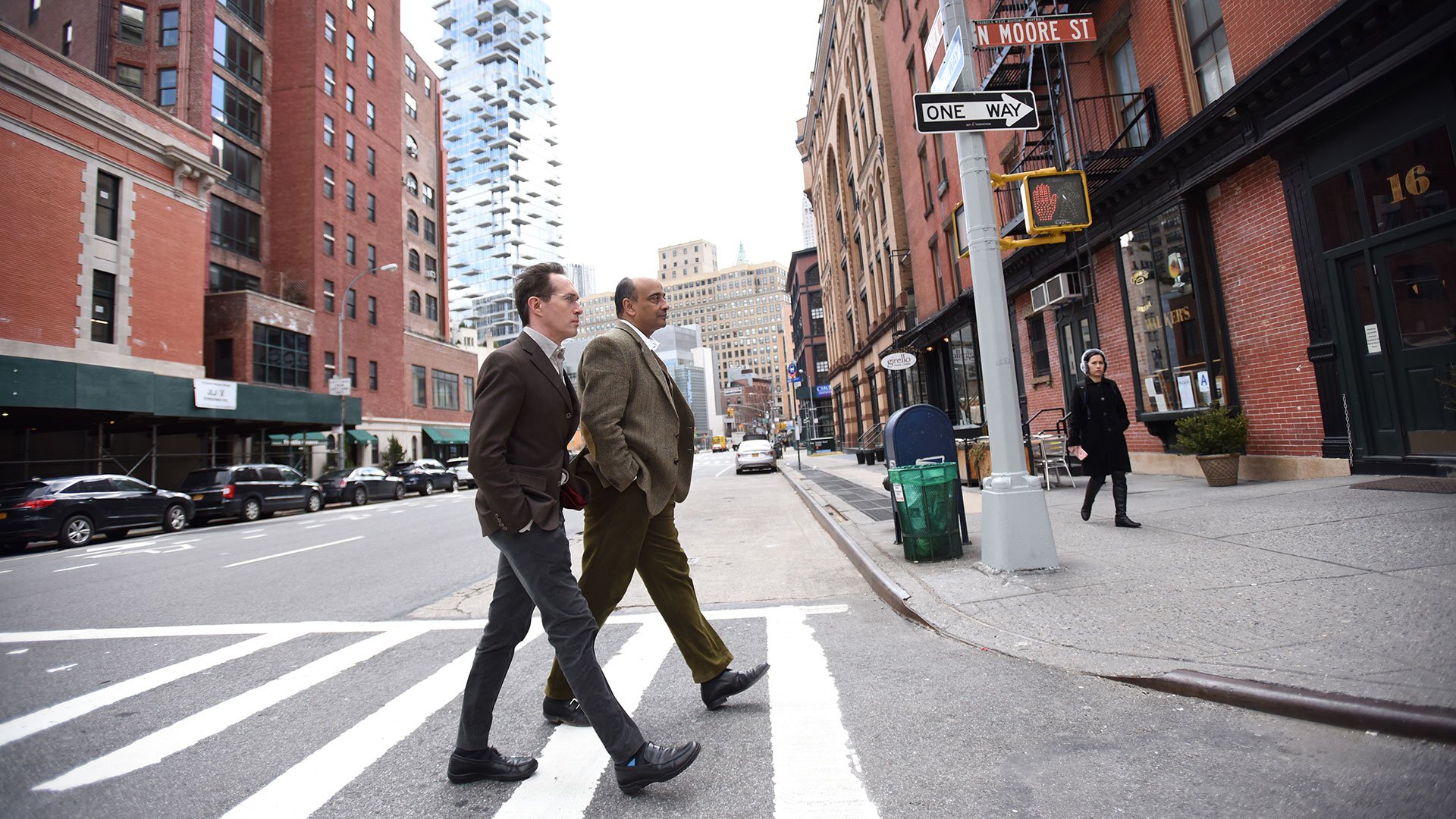Kwame Anthony Appiah walking across the street