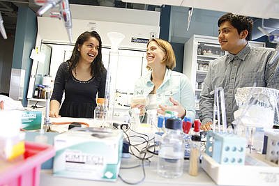 Brandeis University biology professor Melissa Kosinski-Collins (center) with students; photo courtesy Brandeis University RTEmagicC_SciPosseLab03.jpg