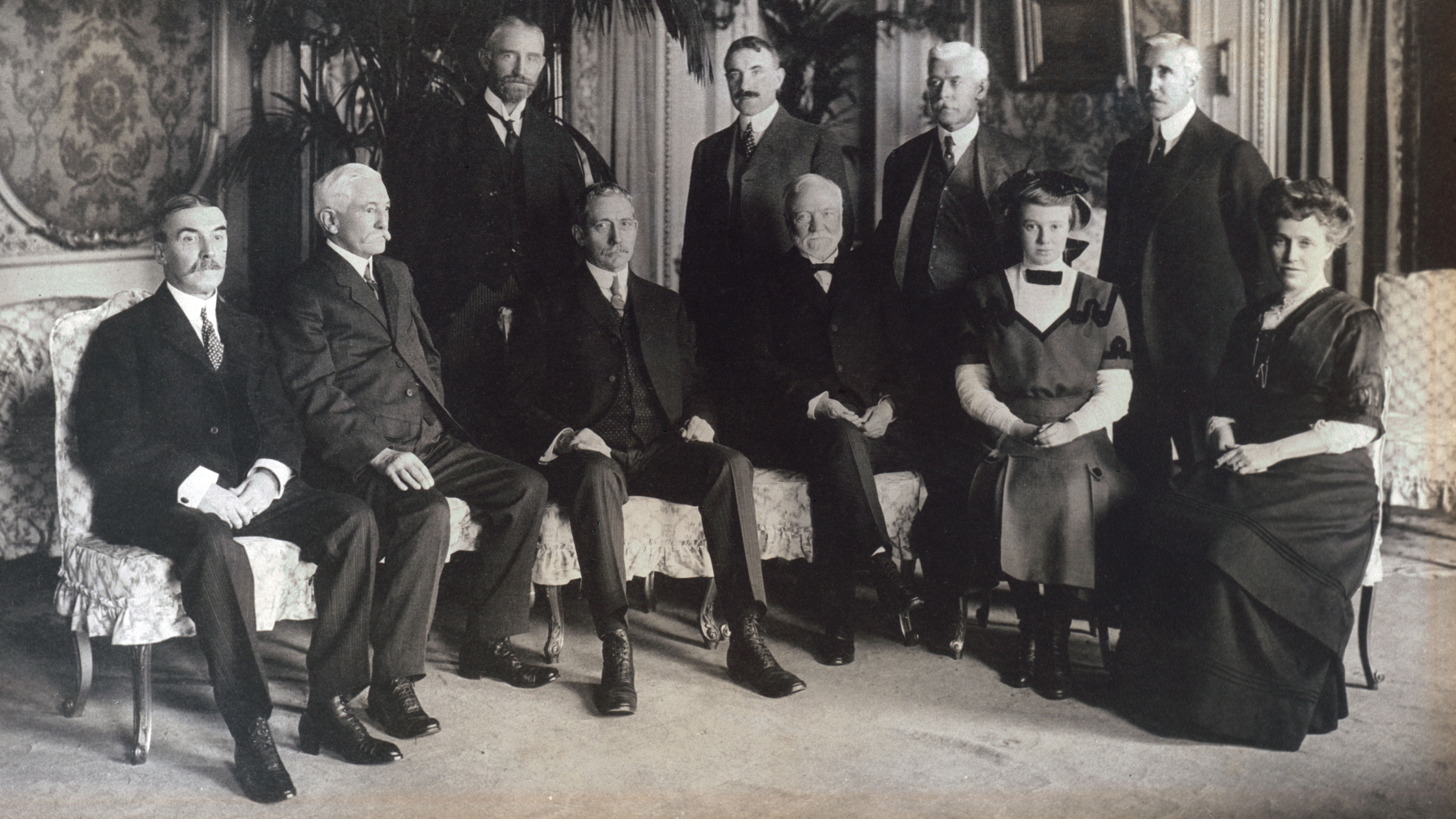 The first meeting of Carnegie Corporation of New York’s board of trustees. Carnegie is seated in the front row, third from the right, with his daughter and wife, Alice and Louise, to his left. (Photo: Carnegie Corporation of New York) CCNY-Trustees-mtg-1911-(1).jpg
